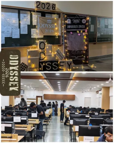 Odyssey 2026 display board and poster at PCCE, above a computer lab full of hackathon participants at their workstations